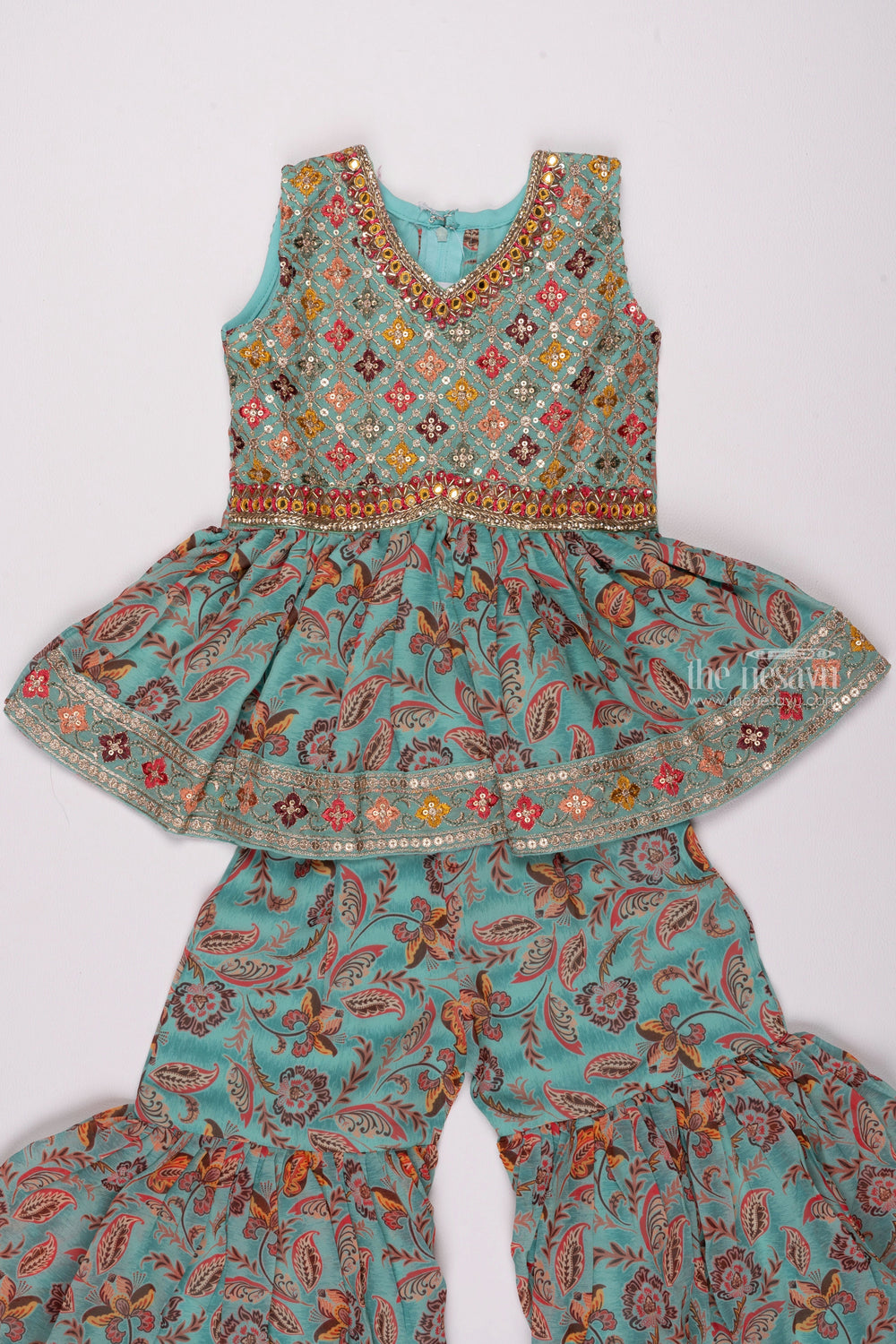 The Nesavu Girls Sharara / Plazo Set Elegant Sequin Embellished Pleated Kurti with Floral Gharara for Graceful Girls Nesavu Sequined Kurti with Gharara for Kids | Girls Trendy Kurti and Gharara Collection | The Nesavu