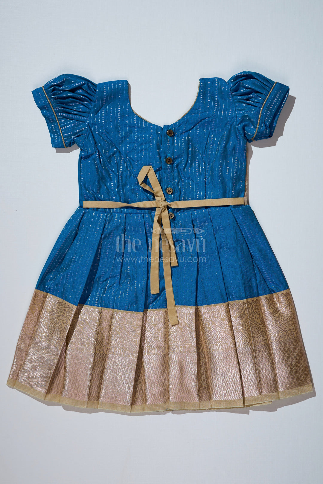 The Nesavu Girls Kanchi Silk Frock Elegant Teal Silk Dress for Girls with Kanchipuram Inspired Fabric and Gold Zari Pleated Border Nesavu Nesavu Teal Silk Dress Girls Kanchipuram Inspired Fabric Gold Zari Pleated Border