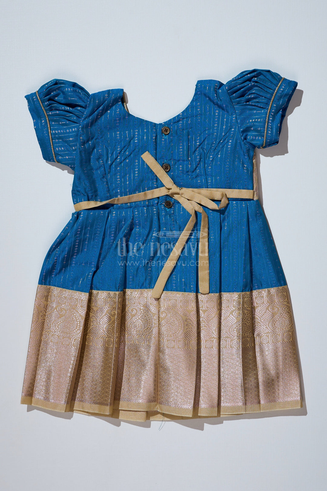 The Nesavu Girls Kanchi Silk Frock Elegant Teal Silk Dress for Girls with Kanchipuram Inspired Fabric and Gold Zari Pleated Border Nesavu Teal Silk Dress Girls Kanchipuram Inspired Fabric Gold Zari Pleated Border | The Nesavu