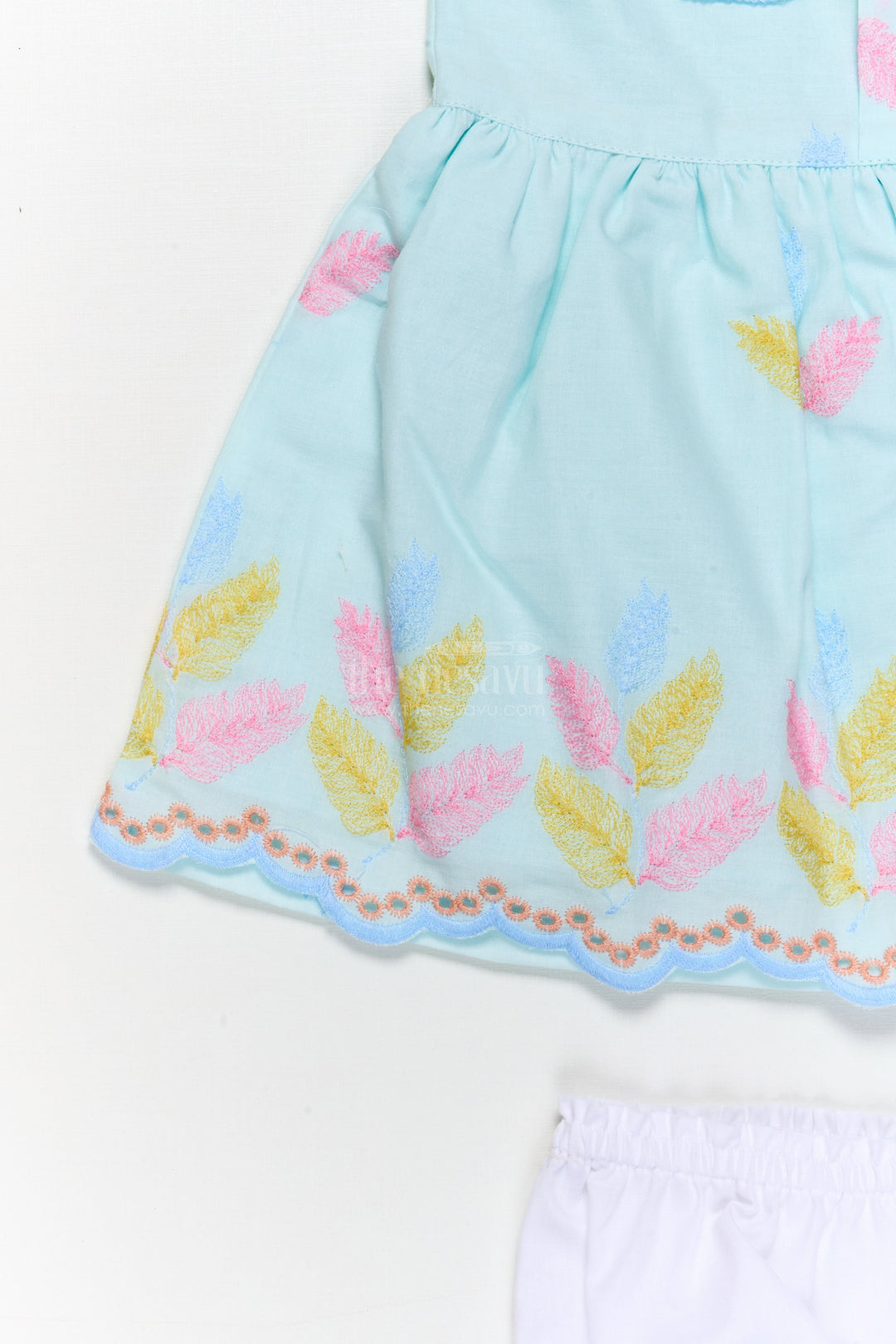 The Nesavu Baby Cotton Frocks Embroidered Baby Frock and Bloomer Set with Playful Leaf Detailing Nesavu Baby frock and bloomer set with multicolor leaf embroidery and character motif