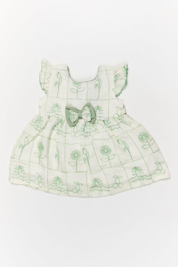 The Nesavu Baby Cotton Frocks Embroidered Cotton Frock for Baby Girls with Classic Bow Accent Nesavu 14 (6M) / Cream / Cotton Blend BFJ911C-14 Nesavu cotton blend frock with floral embroidery and ruffle sleeves for baby girls