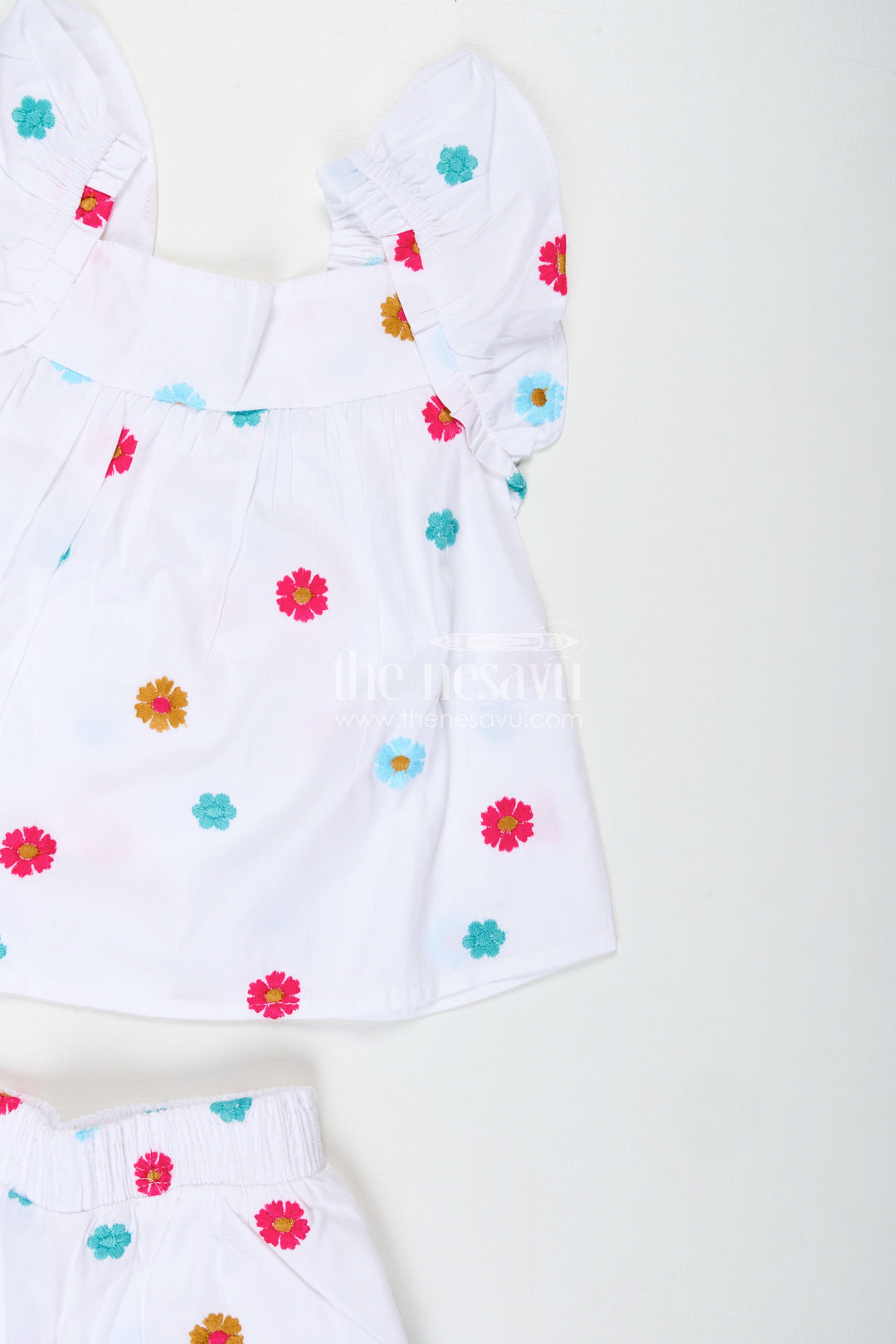 The Nesavu Girls Cotton Frock Embroidered Cotton Outfit for Baby Girls Summer Wear Nesavu Nesavu Baby Girl White Cotton Top Shorts Set Pom-Poms Colorful Thread Embroidery
