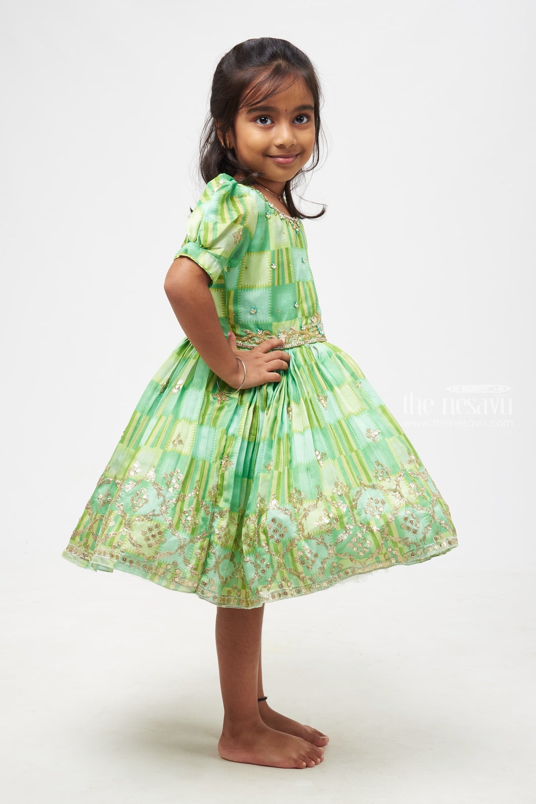 The Nesavu Silk Party Frock Emerald Radiance Girls Dress with Golden Embellishments - Designer Silk Frocks for Festives Nesavu Premium Pattu Gowns | Best Silk Frocks for Diwali Online | The Nesavu
