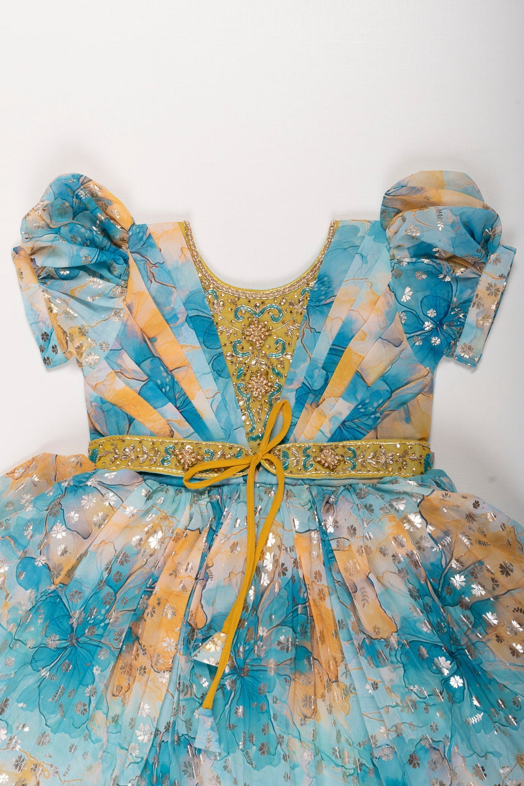 The Nesavu Silk Party Frock Enchanted Garden Silk Party Frock in Blue and Yellow Nesavu Blue & Yellow Floral Silk Frock for Girls | Stone Embroidered Party Dress | The Nesavu