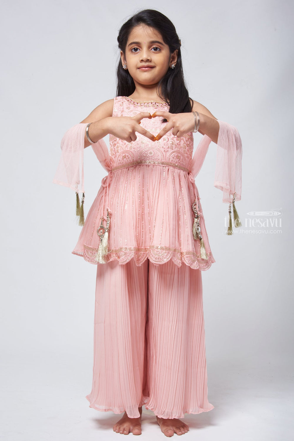 The Nesavu Sets & Suits Enchanting Sequins Embroidered Salmon Peplum Kurti with Palazzo: Festive Wear Delight. Nesavu Latest Designer Dresses for Girls | Kurti and Palazzo suit for Girls | The Nesavu