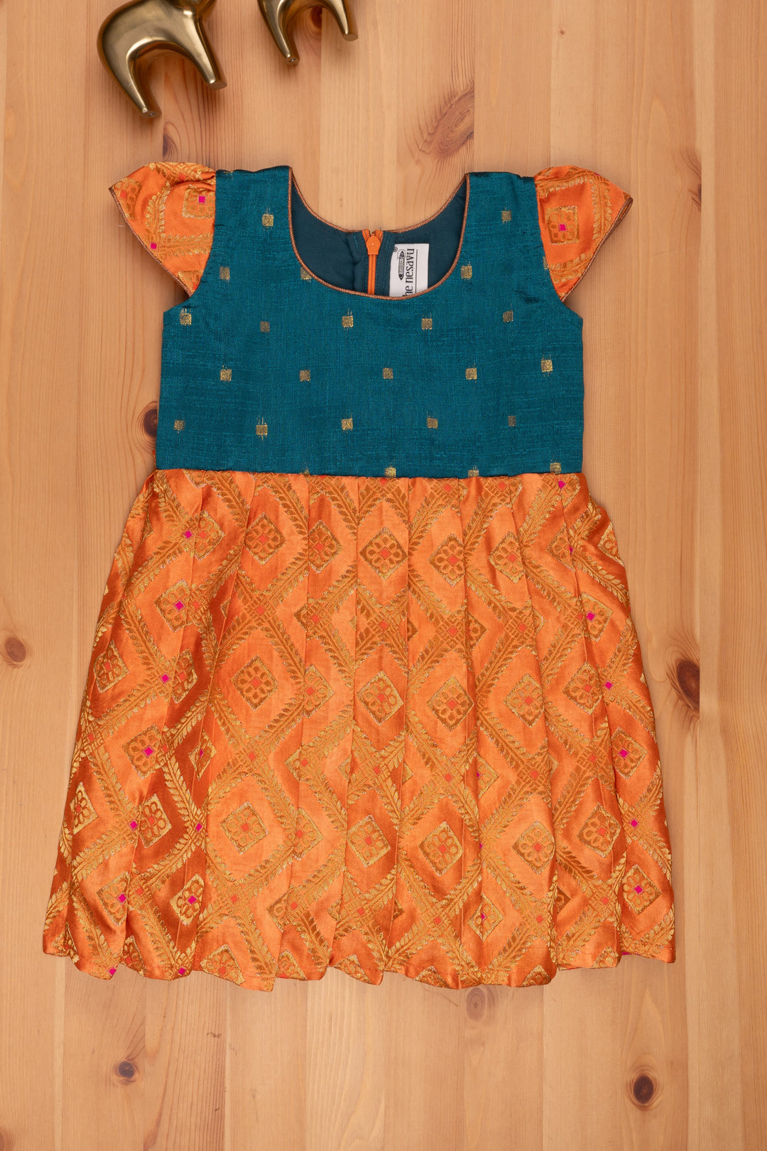 The Nesavu Silk Frock Enchanting Zari with Floral Designer Reshmi Frock in Orange with Zari Butta Design Green Yoke Nesavu 16 (1Y) / Orange SF646-16 Floral Designer Pleated Frock | Orange Silk Frock | The Nesavu