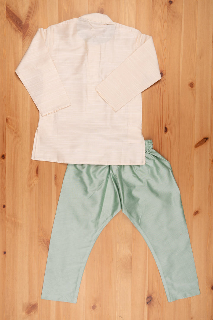The Nesavu Boys Kurtha Set Ethereal Ensemble Cream Kurta & Aqua Pant with Exquisite Threadwork - Silk Elegance for Boys Nesavu Latest Boys Kurta Collection | Designer Boys Ethnic Outfit | The Nesavu