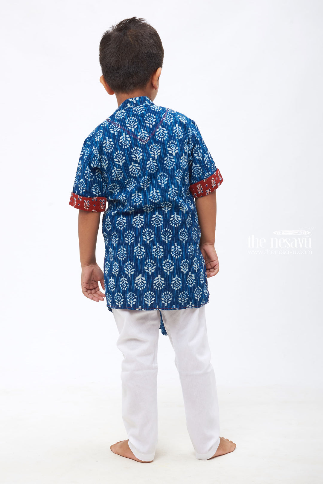 The Nesavu Boys Kurtha Set Ethnic Ikat Print Blue Shirt with Traditional Accents & White Pants - Kids Kurta Trousers Combo for Festive Wear Nesavu Dashing Boys Kurta Sets | Festive and Traditional | The Nesavu