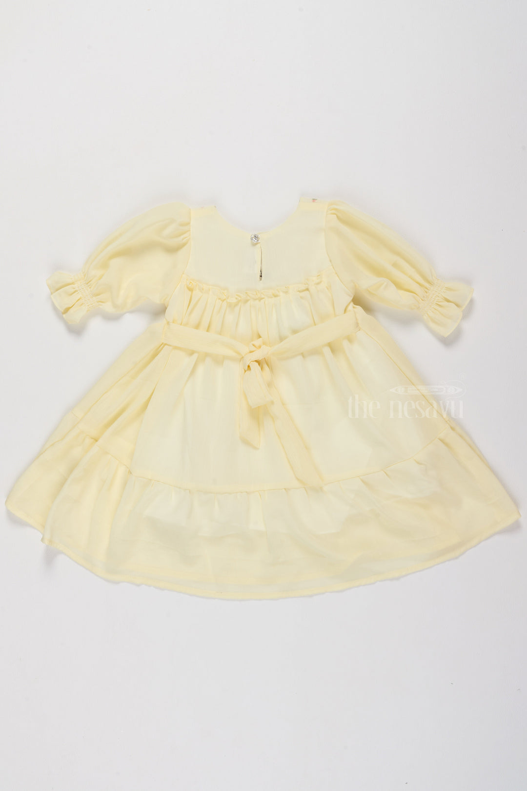 The Nesavu Girls Fancy Frock Fancy Casual Outfits for Girls in Soft Yellow with Floral Embroidery Nesavu Nesavu Fancy Casual Outfits Girls Floral Embroidery Smocked Bodice