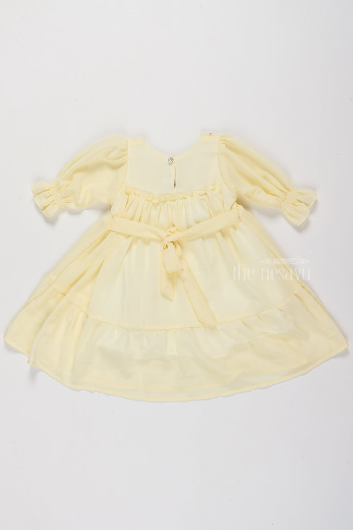 The Nesavu Girls Fancy Frock Fancy Casual Outfits for Girls in Soft Yellow with Floral Embroidery Nesavu Nesavu Fancy Casual Outfits Girls Floral Embroidery Smocked Bodice