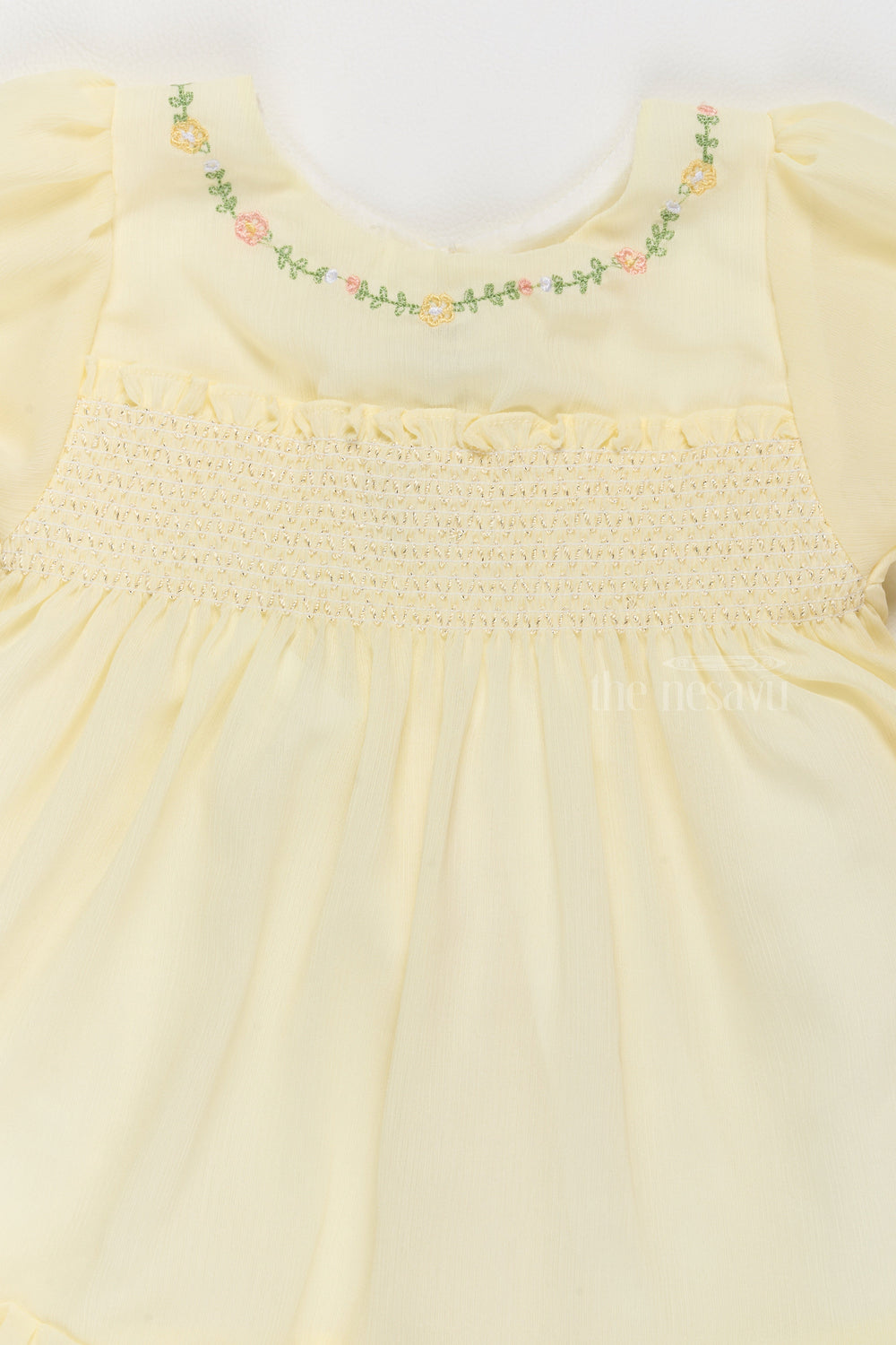 The Nesavu Girls Fancy Frock Fancy Casual Outfits for Girls in Soft Yellow with Floral Embroidery Nesavu Nesavu Fancy Casual Outfits Girls Floral Embroidery Smocked Bodice