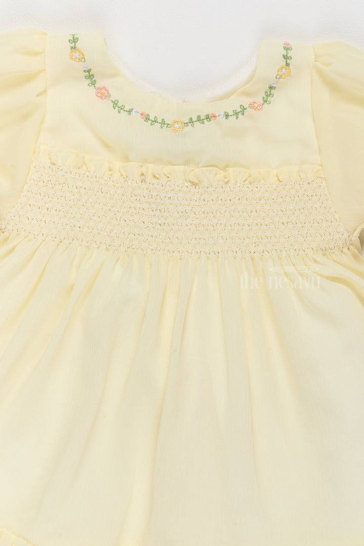 The Nesavu Girls Fancy Frock Fancy Casual Outfits for Girls in Soft Yellow with Floral Embroidery Nesavu Nesavu Fancy Casual Outfits Girls Floral Embroidery Smocked Bodice