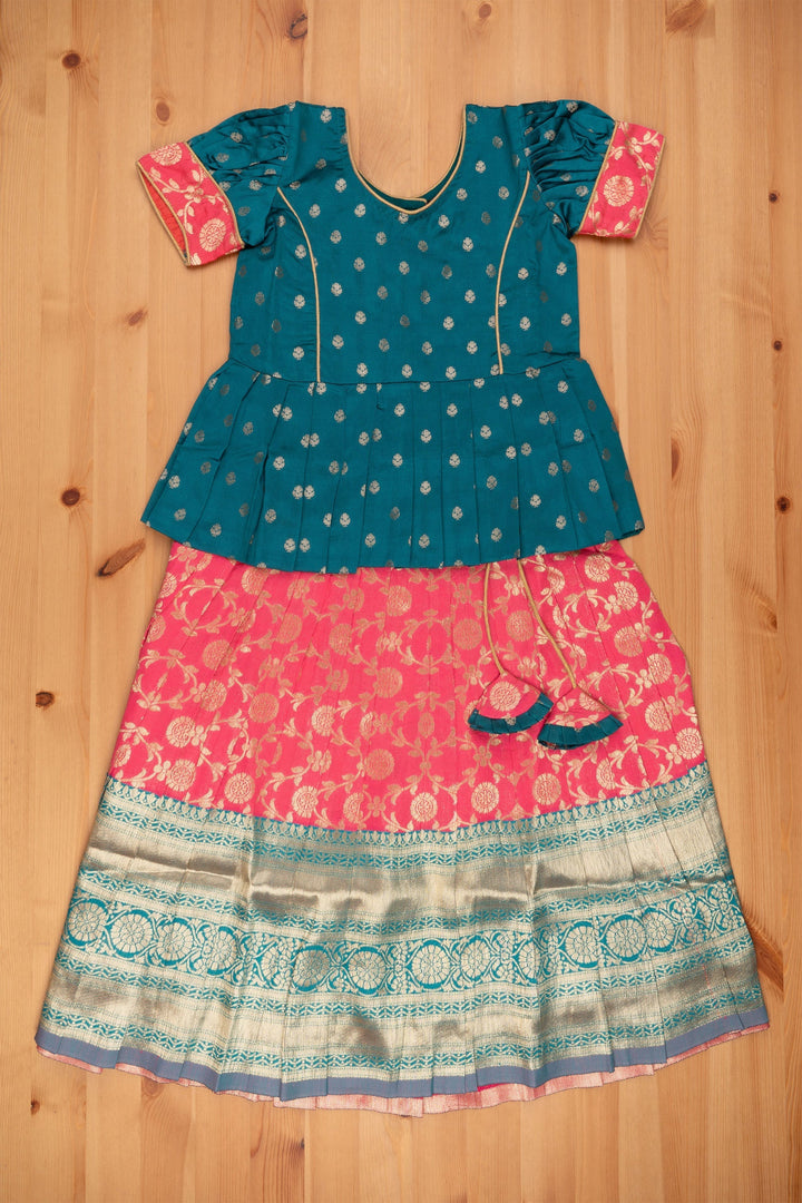 The Nesavu Girls Pattu Pavadai Floral Butta Green Peplum Blouse combined with Banarasi Pink Pattu Pavadai Traditional Festive Wear Nesavu Banaras Designer Pattu Pavadai | Silk Skirt With Blouse for Girls | the Nesavu