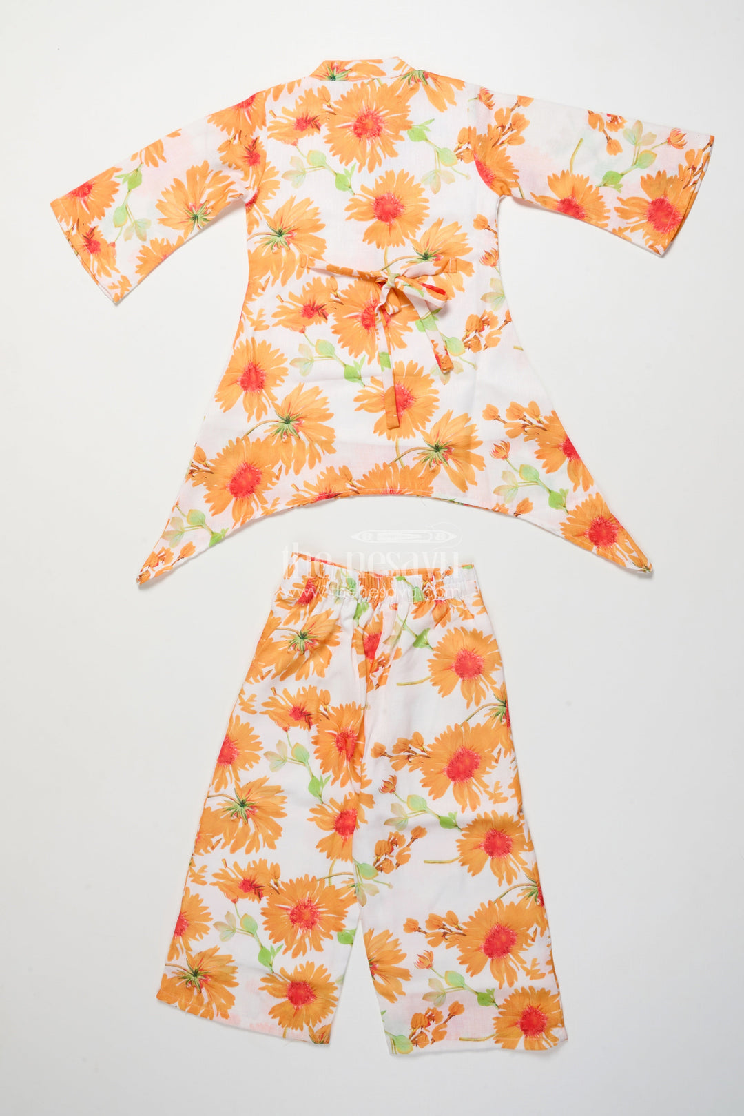 The Nesavu Girls Casual Set Floral Cotton Kurta Pant Set with Asymmetrical Hem for Casual Wear Nesavu Nesavu girls floral cotton kurta set asymmetrical hem straight pants