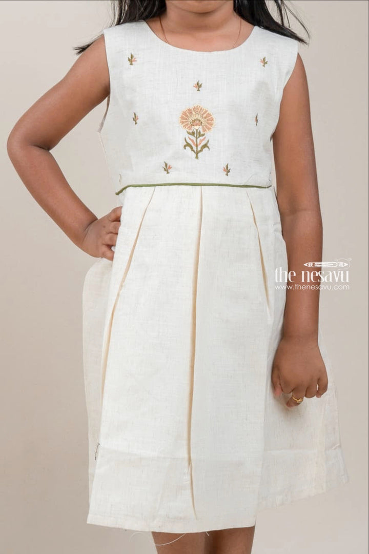 The Nesavu Girls Cotton Frock Floral Embroidered Box Pleated Sleeveless Half White Cotton Frock for Girls Nesavu Floral Embroidered Box Pleated Sleeveless Beige Cotton Frock for Girls | The Nesavu