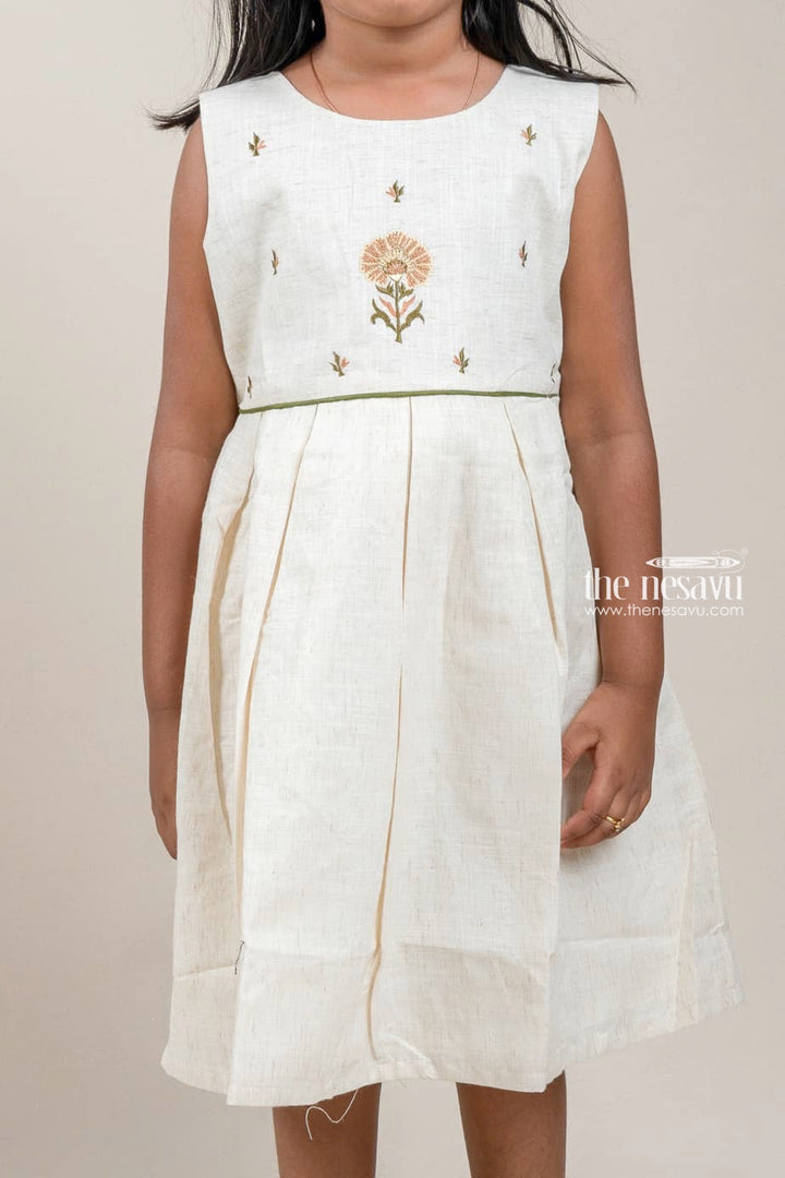 The Nesavu Girls Cotton Frock Floral Embroidered Box Pleated Sleeveless Half White Cotton Frock for Girls Nesavu Floral Embroidered Box Pleated Sleeveless Beige Cotton Frock for Girls | The Nesavu