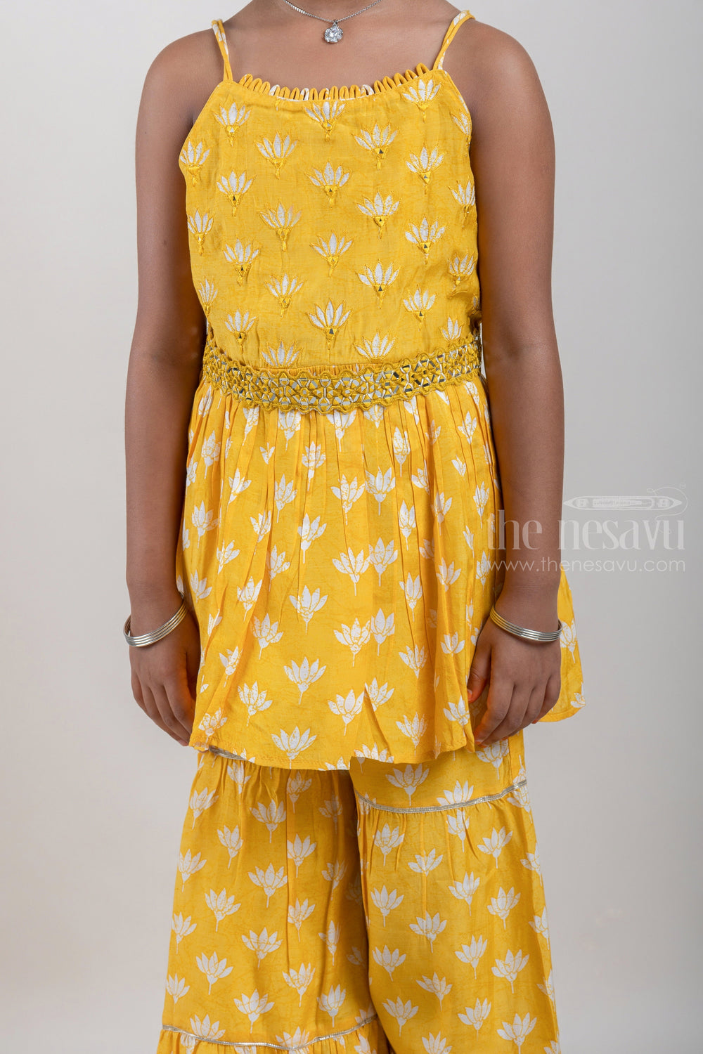 The Nesavu Girls Sharara / Plazo Set Floral Printed Pleated Peplum Pattern Yellow Kurti with Layered Palazzo Suit for Girls with Organza Dupatta Nesavu Shop Girls Floral Printed Kurti with Layered Palazzo Suit Online | Designer Ethnic Wear Ideas | The Nesavu