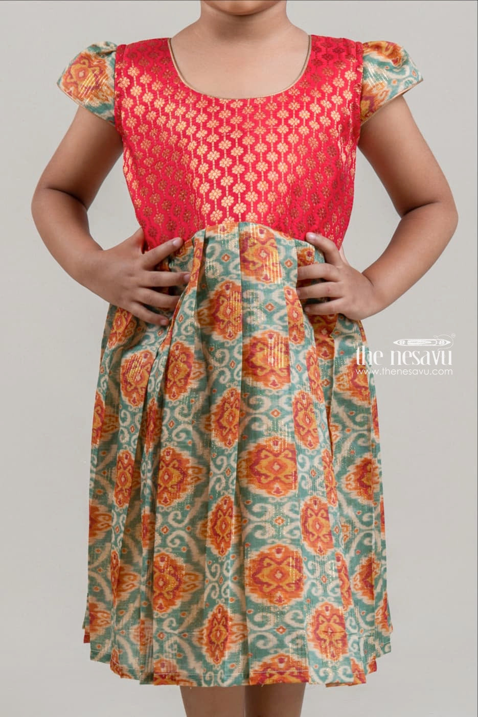The Nesavu Girls Fancy Frock Floral Zari Printed Red Yoke with Ikat Printed Pleated Silk Cotton Frock for Girls Nesavu Floral Zari Printed Red Yoke with Ikat Printed Pleated Silk Cotton Frock for Girls | The Nesavu