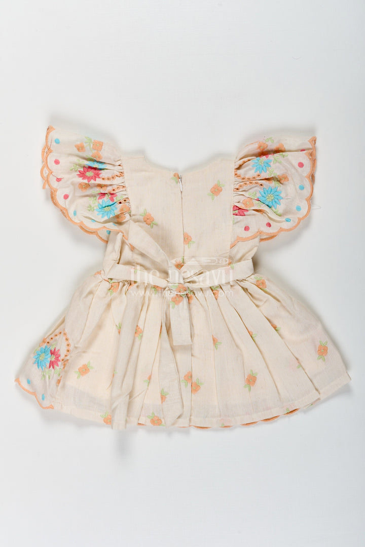 The Nesavu Baby Cotton Frocks Frock Baby in Cream Cotton with Multicolor Thread Embroidery and Angel Sleeves Nesavu Nesavu Frock Baby Cream Cotton Multicolor Thread Embroidery Angel Sleeves