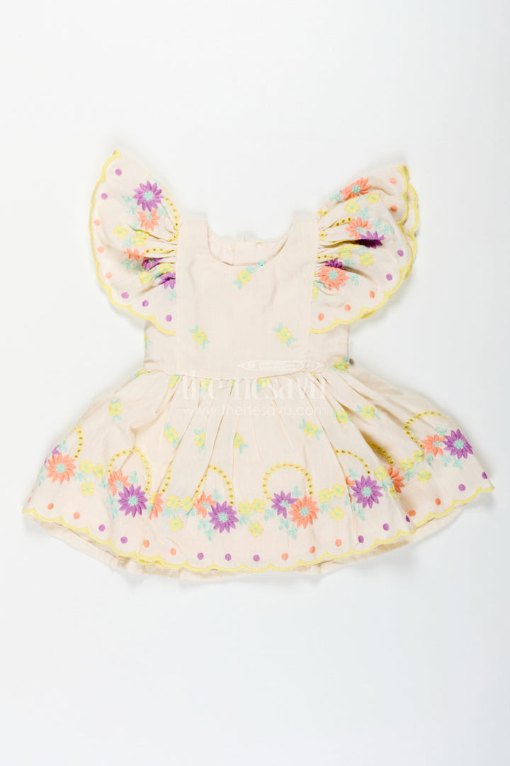 The Nesavu Baby Cotton Frocks Frock Party Wear for Baby Girls in Cotton with Vibrant Thread Embroidery and Butterfly Sleeves Nesavu Nesavu Frock Party Wear Baby Girls Cream Cotton Floral Thread Embroidery