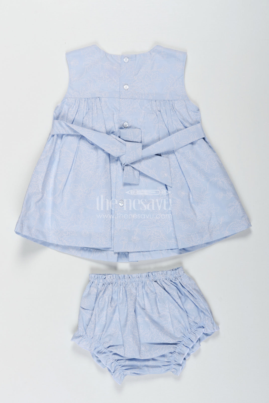 The Nesavu Baby Cotton Frocks Frock Suit Cotton Mein in Light Blue Floral Self-Printed Fabric with White Yoke and Bloomers Nesavu Nesavu Frock Suit Cotton Mein Blue Self Floral Print White Yoke Bloomers