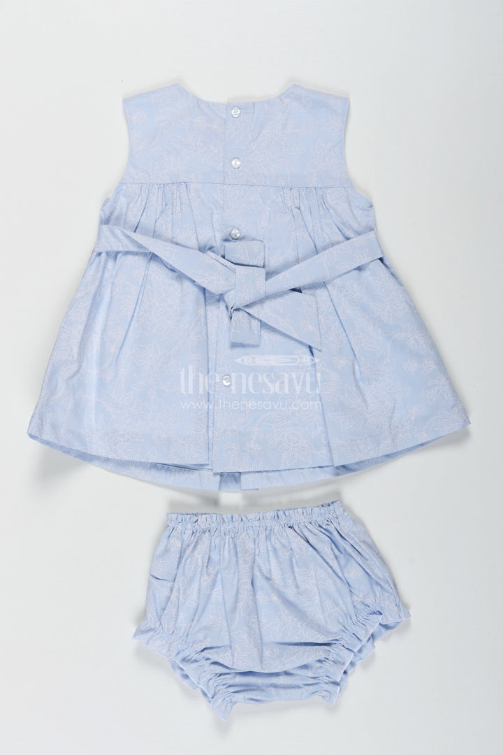 The Nesavu Baby Cotton Frocks Frock Suit Cotton Mein in Light Blue Floral Self-Printed Fabric with White Yoke and Bloomers Nesavu Nesavu Frock Suit Cotton Mein Blue Self Floral Print White Yoke Bloomers