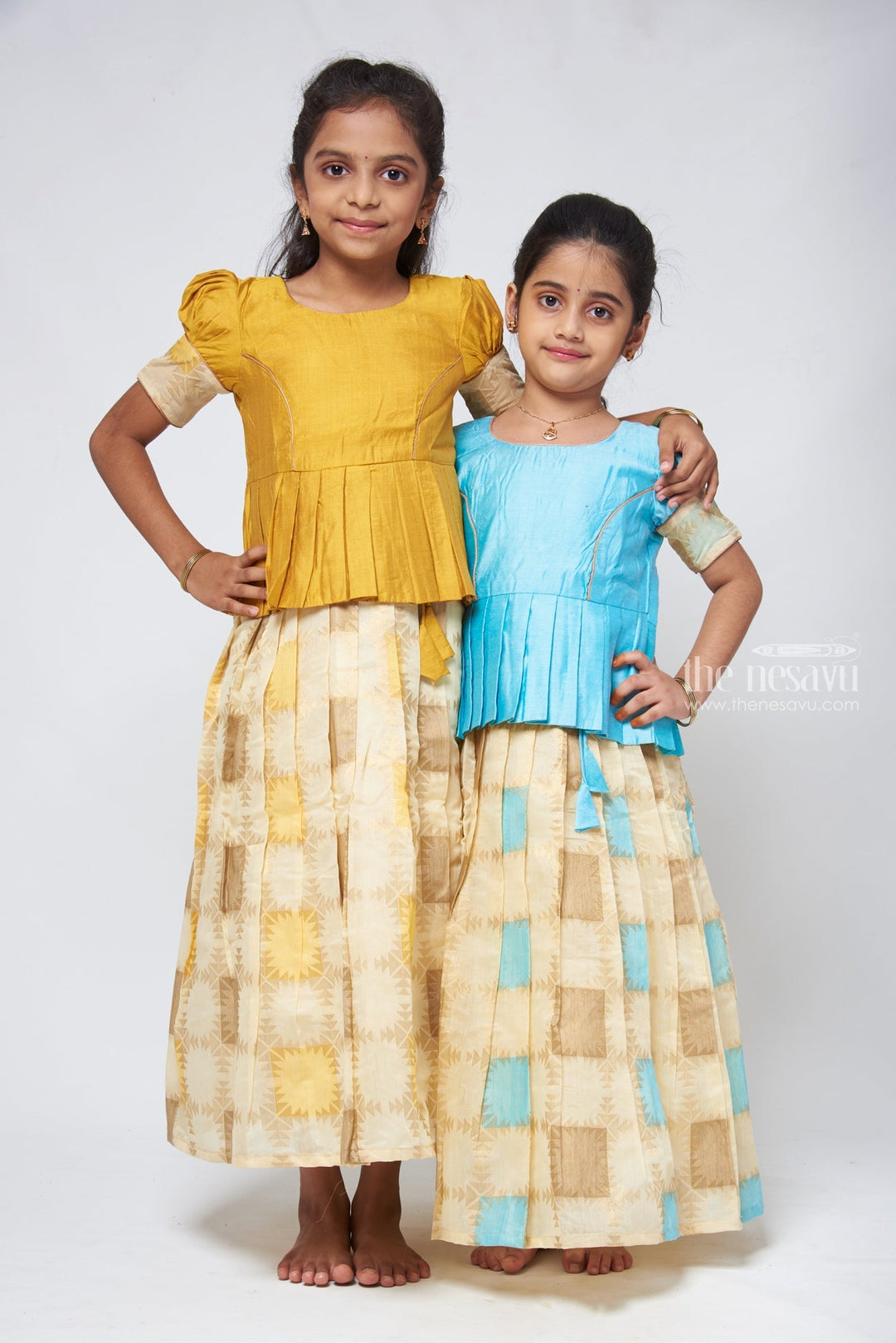 The Nesavu Pattu Pavadai Geometrical Designer Pleated Skirt and Blue Jacquard Silk Blouse Nesavu Pattu Pavadai Latest Designs | Girls Traditional Dress | The Nesavu
