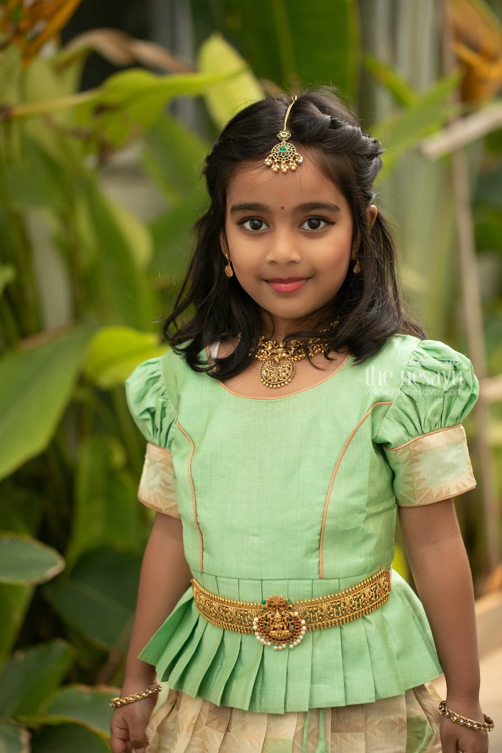The Nesavu Pattu Pavadai Geometrical Designer Pleated Skirt and Green Jacquard Silk Blouse Nesavu Pattu Pavadai New Designs | Girls Traditional Dress | The Nesavu