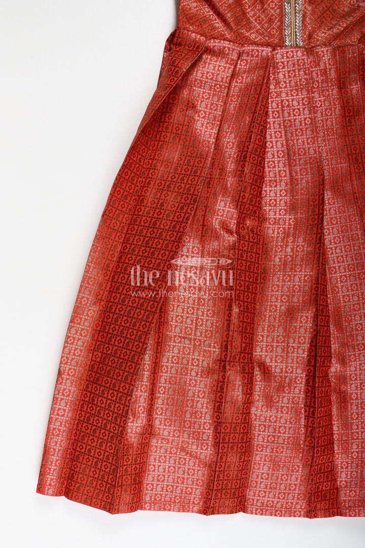 The Nesavu Girls Silk Gown Girls Anarkali Dress Design in Semi Banaras Silk with Rust Orange Zari Brocade and Flared Box Pleats Nesavu Nesavu Girls Anarkali Dress Design Rust Orange Semi Banaras Silk Golden Zari Pleated Skirt