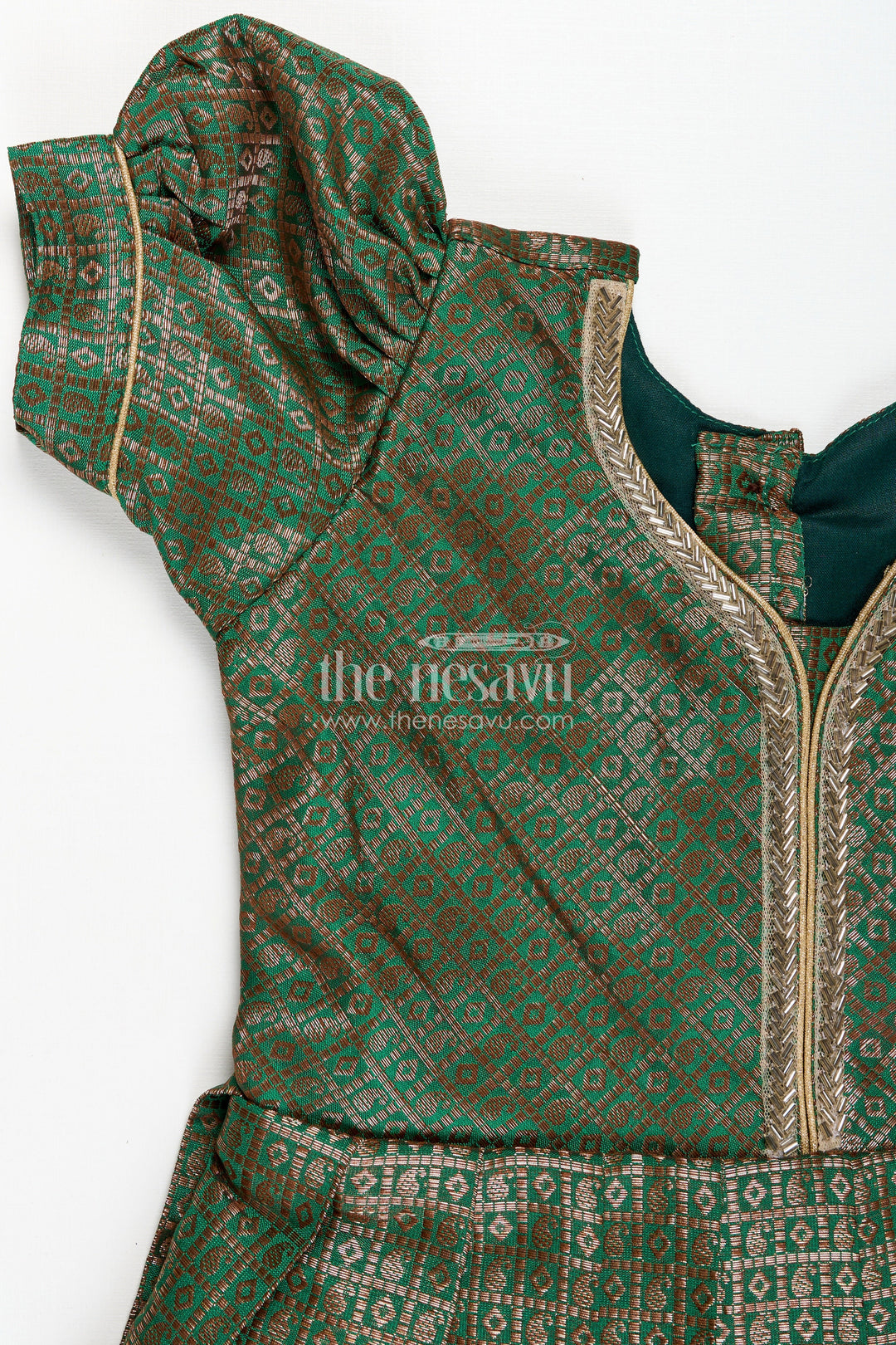 The Nesavu Girls Silk Gown Girls Anarkali Gown Designs in Semi Banaras Silk with Rich Green Zari Weave and Flared Pleated Skirt Nesavu Nesavu Girls Anarkali Gown Designs Green Semi Banaras Silk Flared Zari Pleated Skirt