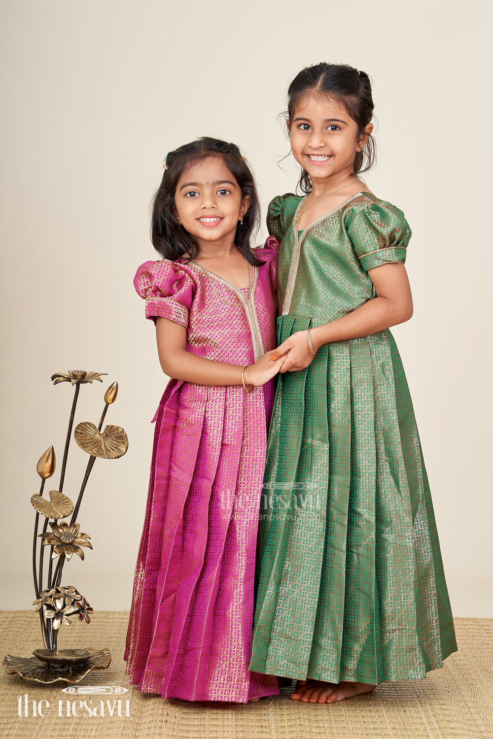 The Nesavu Girls Silk Gown Girls Anarkali Gown Designs in Semi Banaras Silk with Rich Green Zari Weave and Flared Pleated Skirt Nesavu Nesavu Girls Anarkali Gown Designs Green Semi Banaras Silk Flared Zari Pleated Skirt