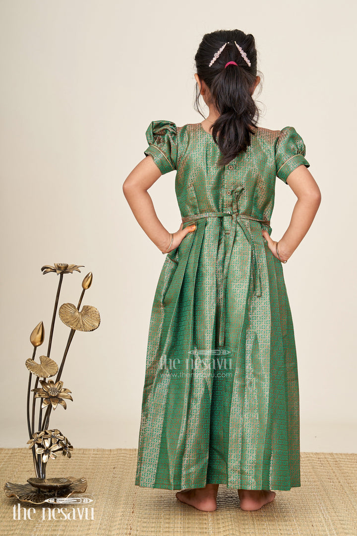 The Nesavu Girls Silk Gown Girls Anarkali Gown Designs in Semi Banaras Silk with Rich Green Zari Weave and Flared Pleated Skirt Nesavu Nesavu Girls Anarkali Gown Designs Green Semi Banaras Silk Flared Zari Pleated Skirt