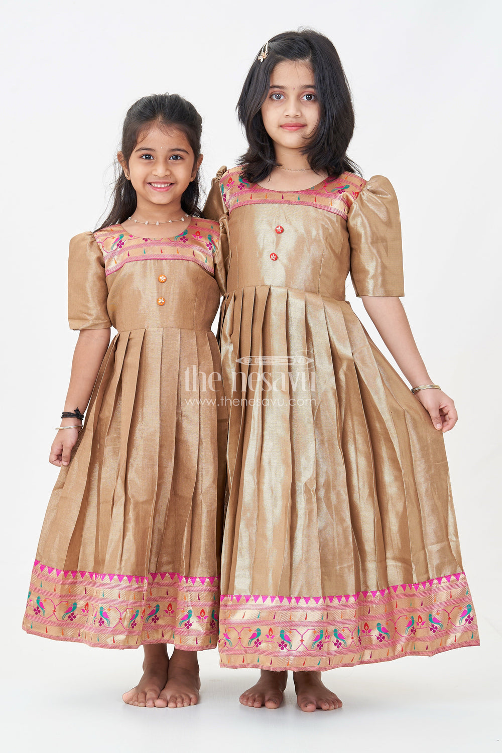 The Nesavu Girls Silk Gown Girls Anarkali Style Gown in Brown Tissue with Paithani Border and Structured Pleats Nesavu Girls Anarkali Style Gown Brown Tissue Silk Paithani Border Puff Sleeves | The Nesavu