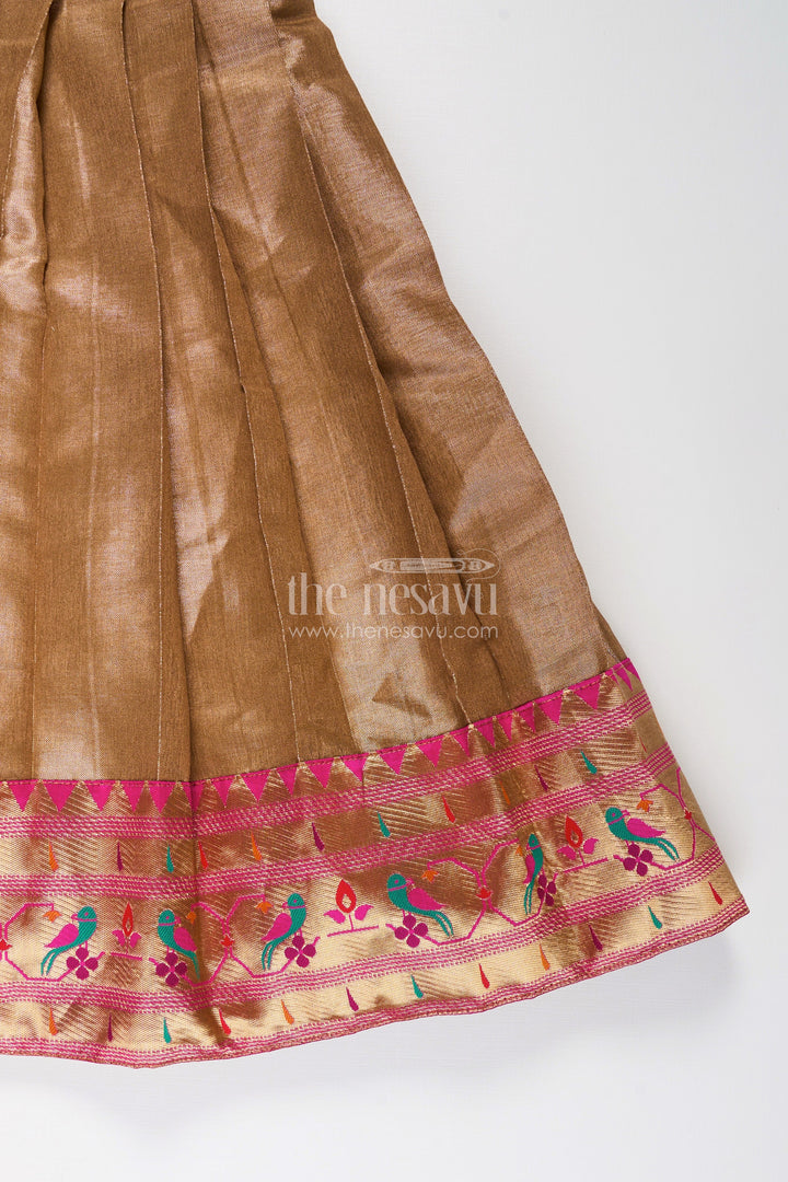 The Nesavu Girls Silk Gown Girls Anarkali Style Gown in Brown Tissue with Paithani Border and Structured Pleats Nesavu Girls Anarkali Style Gown Brown Tissue Silk Paithani Border Puff Sleeves | The Nesavu