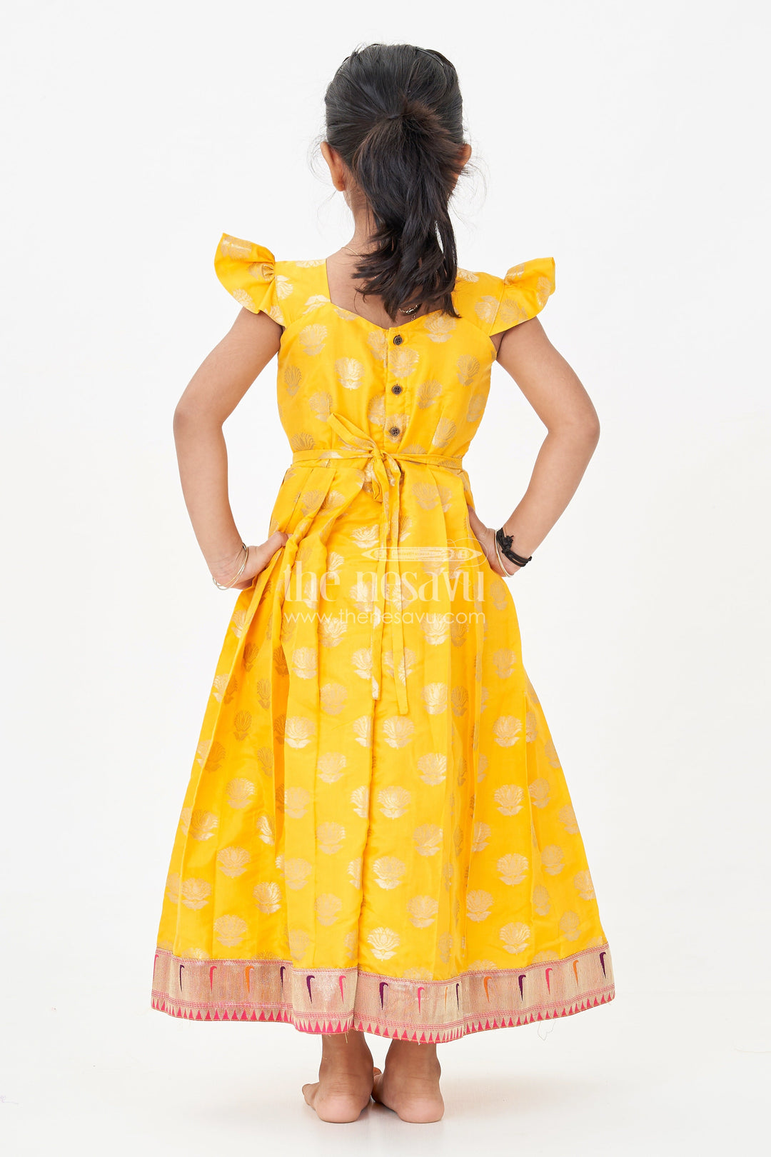 The Nesavu Girls Silk Gown Girls Banarasi Anarkali Gown in Yellow Semi Banaras Silk with Paithani Yoke and Gold Motifs Nesavu Nesavu Girls Banarasi Anarkali Gown in Yellow Semi Banaras Silk with Paithani Embroidered Yoke