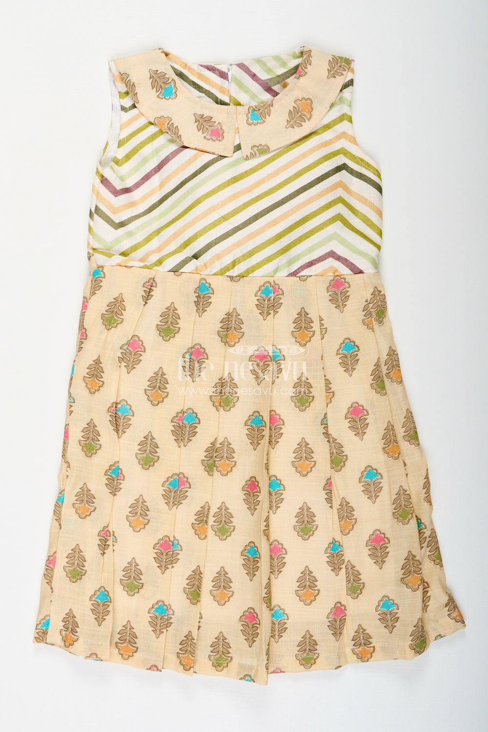The Nesavu Girls Cotton Frock Girls beige cotton frock with earthy-toned floral block print Nesavu 18 (2Y) / Beige GFC1955B-18 Nesavu girls beige cotton frock with multicolor floral print and pleated flare