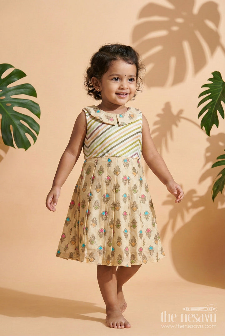 The Nesavu Girls Cotton Frock Girls Beige Cotton Frock with Earthy-Toned Floral Block Print Nesavu 18 (2Y) / Beige GFC1955B-18 Nesavu girls beige cotton frock with multicolor floral print and pleated flare