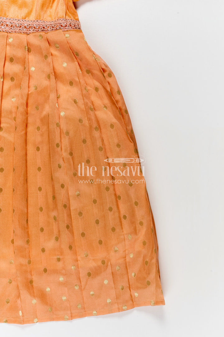 The Nesavu Girls Silk Gown Girls Birthday Gowns in Peach Raw Silk with Semi Banarasi Bottom and Peter Pan Collar Nesavu Nesavu Girls Peach Raw Silk Birthday Gowns Semi Banarasi Gold Motif Bottom