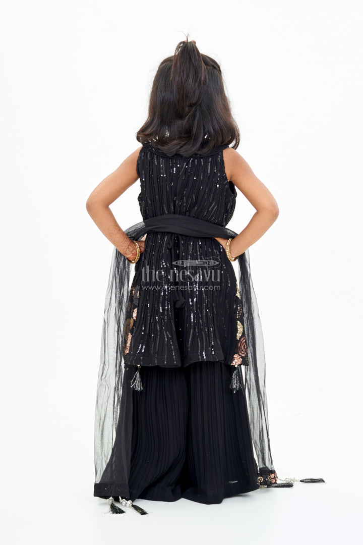 The Nesavu Girls Sharara / Plazo Set Girls Black Kurti with Plazo Featuring Gold Embroidery and Tassel Details Nesavu Nesavu Girls Black Kurti Plazo Featuring Gold Embroidery Tassel Details