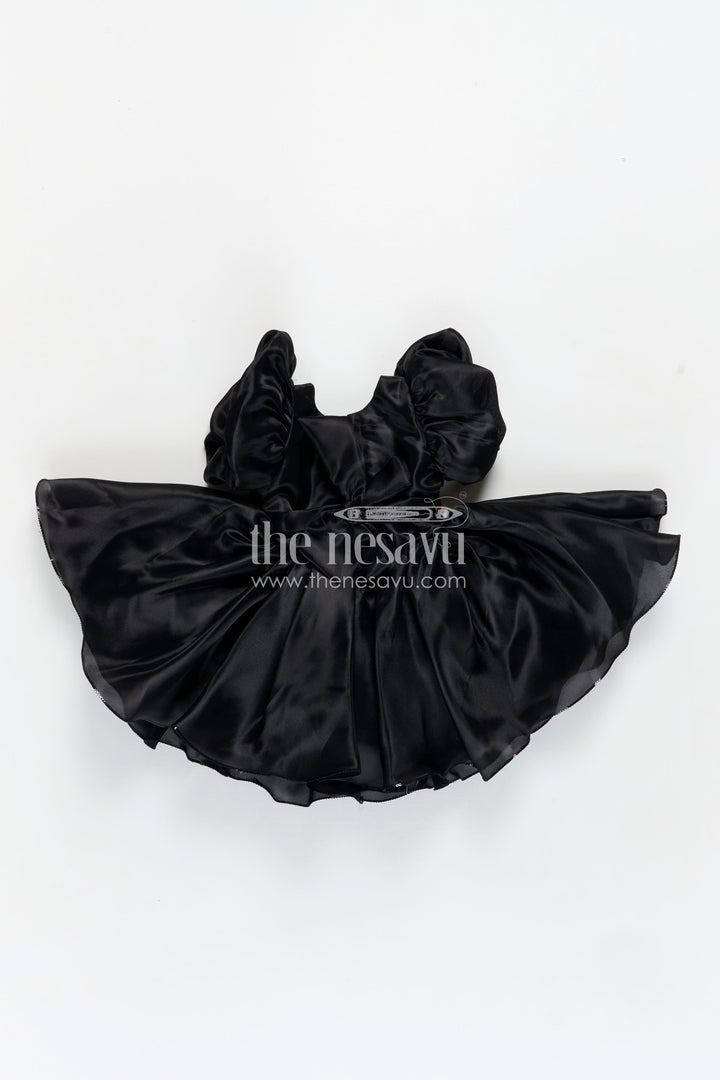 The Nesavu Girls Fancy Party Frock Girls Black Satin frock ke design new with Puffy Sleeves and Red Floral Accent for Stylish Comfort Nesavu Nesavu Girls Black Satin Puff Sleeve Dress Red Flower Detail frock ke design new Style