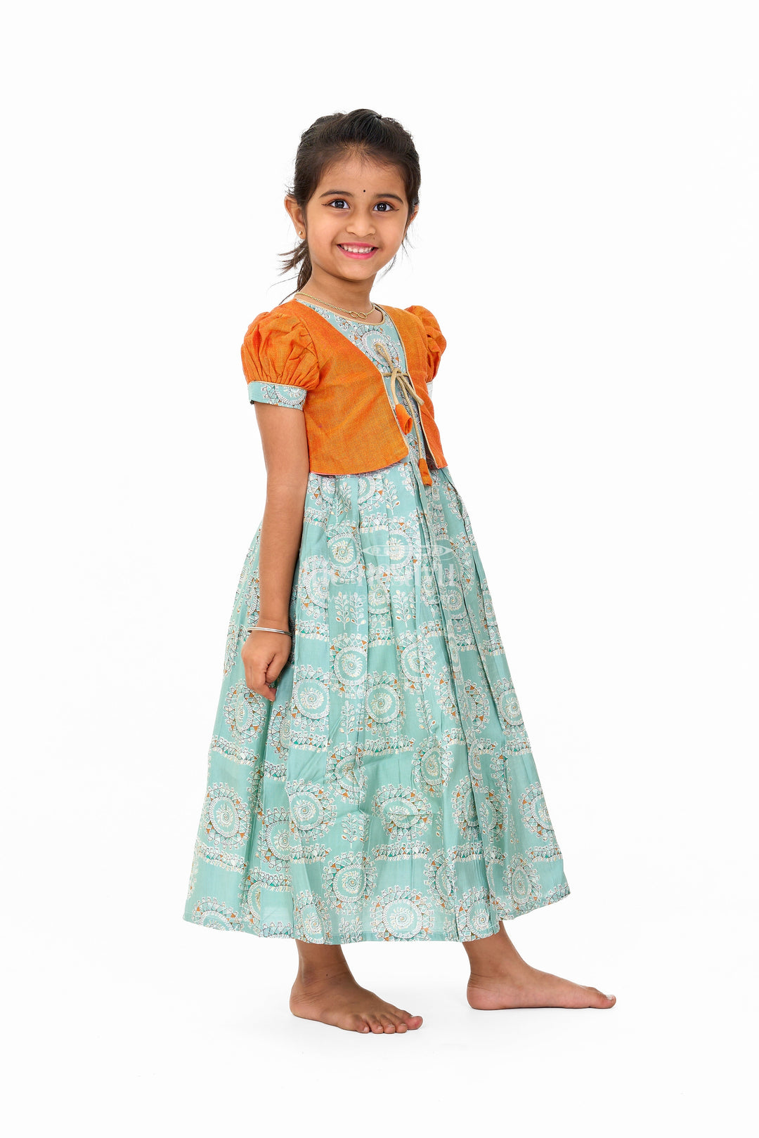 The Nesavu Girls Silk Gown Girls Blue Wedding Anarkali Dress with Traditional Prints and Contrast Orange Short Jacket Nesavu Nesavu Girls Blue Wedding Anarkali Dress Traditional Prints Contrast Orange Short Jacket