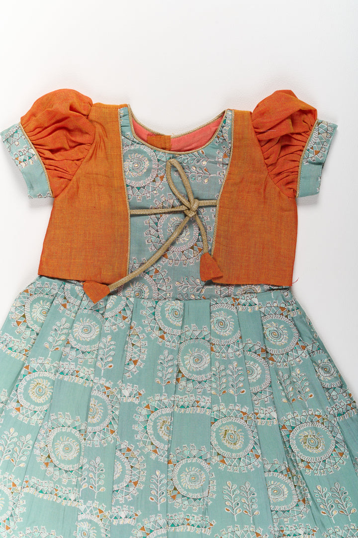 The Nesavu Girls Silk Gown Girls Blue Wedding Anarkali Dress with Traditional Prints and Contrast Orange Short Jacket Nesavu Nesavu Girls Blue Wedding Anarkali Dress Traditional Prints Contrast Orange Short Jacket