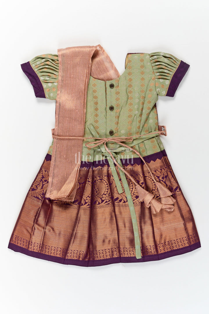 The Nesavu Girls Kanchi Silk Frock Girls Brown Silk Dress in Semi Kanchivaram with Rich Thread Embroidery and Lace Embellished Dupatta Nesavu Nesavu Girls Brown Silk Dress in Semi Kanchivaram with Embroidered Dupatta and Traditional Zari Patterns