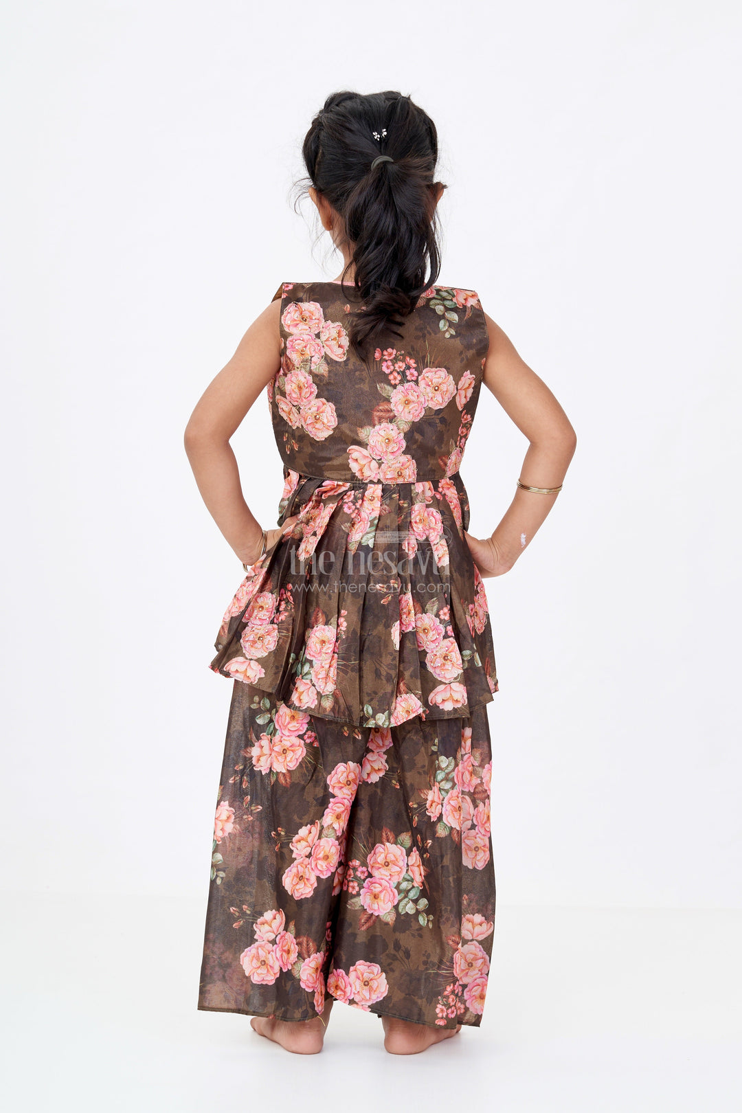 The Nesavu Girls Sharara / Plazo Set Girls Brown Suit Set in Floral Shimmer Georgette  with Peach Embroidered Top and Peplum Jacket Nesavu Nesavu Girls Brown Suit Set Floral Shimmer Georgette Palazzo Jacket Peach Embroidered Top
