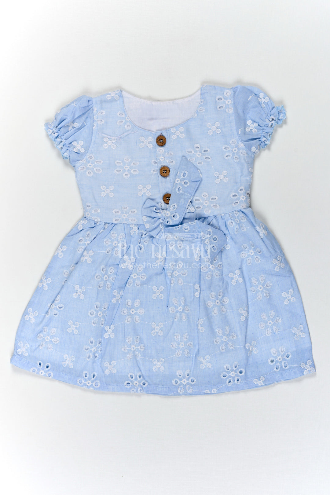 The Nesavu Girls Cotton Frock Girls Casual Wear Party Dress in Sky Blue Hakoba with Bow Belt and Wooden Button Detail Nesavu 18 (2Y) / Blue GFC1714C-18 Nesavu Casual Wear Party Dress for Girls in Sky Blue Hakoba with Embroidery and Waist Bow