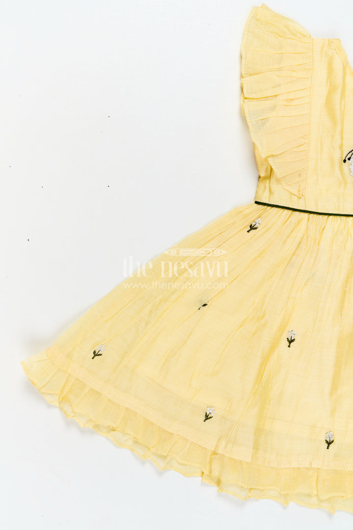 The Nesavu Girls Chanderi Frock Girls Chanderi Cotton Beautiful Frock Design with Butterfly Embroidery and Ruffle Sleeves in Soft Yellow Nesavu Nesavu Girls Chanderi Cotton Yellow Frock Butterfly Embroidery Beautiful Ruffle Design