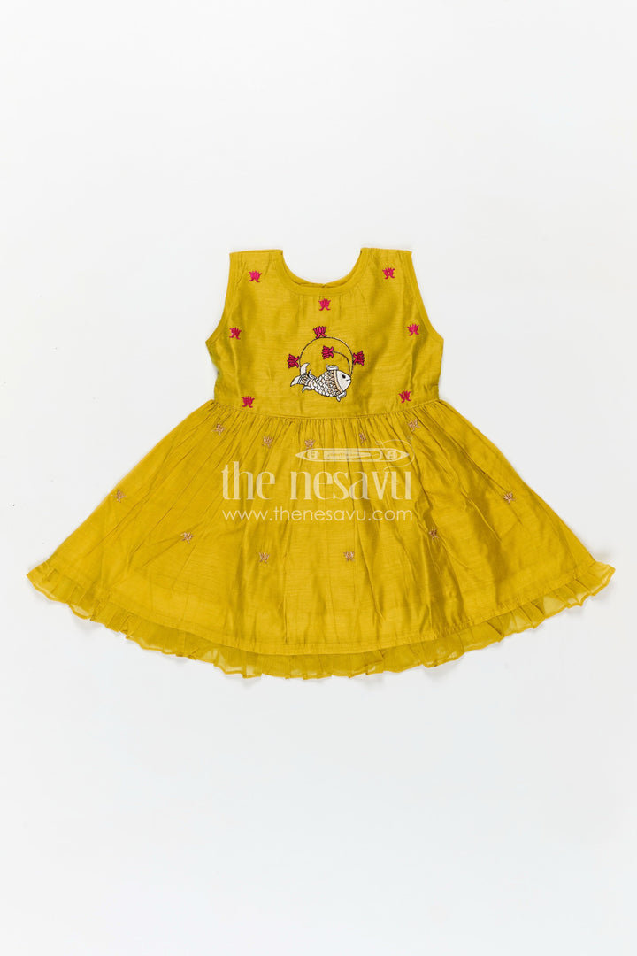 The Nesavu Girls Chanderi Frock Girls Chanderi Cotton Dress Short Dress with Playful Fish Embroidery and Ruffle Hem in Mustard Yellow Nesavu Nesavu Girls Chanderi Cotton Mustard Yellow Short Dress Fish Embroidery Ruffled Hem