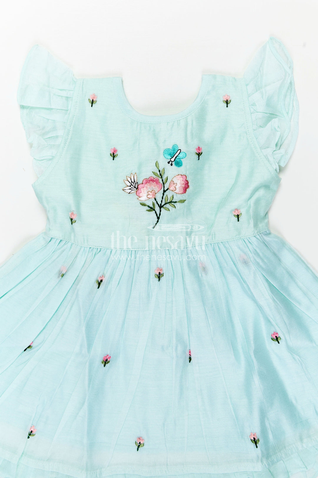 The Nesavu Girls Chanderi Frock Girls Chanderi Cotton Frock Ki Design in Mint Green with Floral and Butterfly Embroidery for Everyday Elegance Nesavu Nesavu Girls Chanderi Cotton Mint Green Frock Ki Design Floral Embroidery Soft Frills