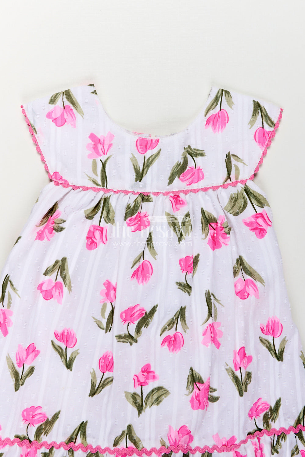 The Nesavu Girls Cotton Frock Girls Color Frock in White Cotton with Pink Floral Print and Frilled Border for Playful Elegance Nesavu Girls Color Frock Pink Floral Cotton Frill Detailing Everyday Wear | The Nesavu