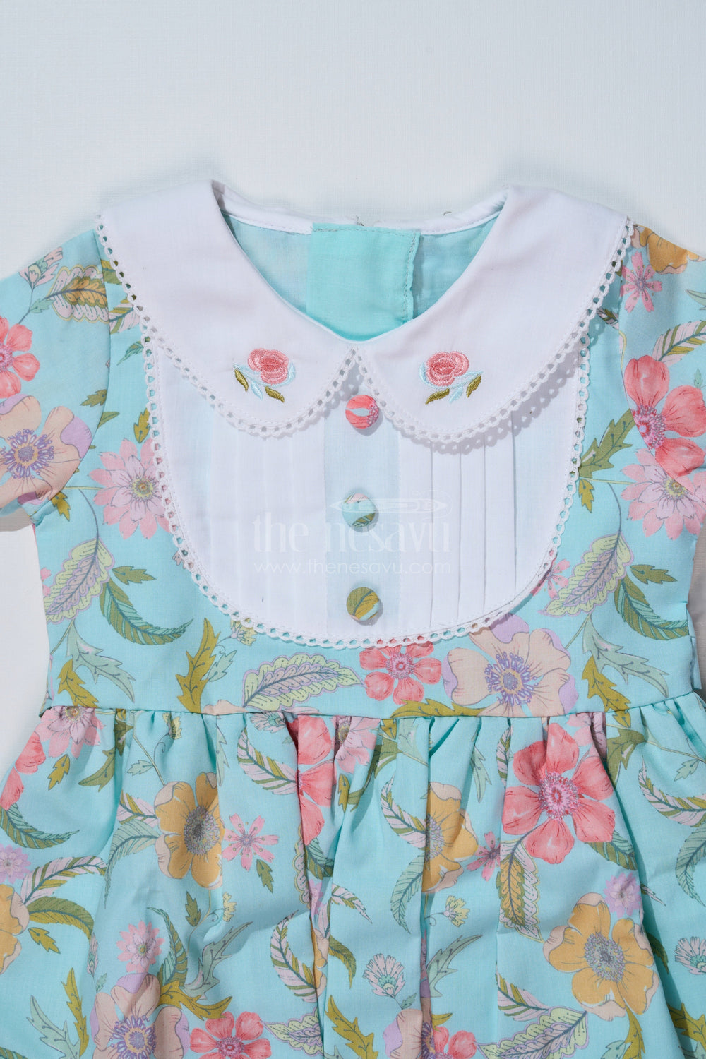 The Nesavu Girls Cotton Frock Girls Cotton Blend Casual Dresses with Floral Prints and Peter Pan Collar for Everyday Comfort Nesavu Nesavu Girls Cotton Blend Casual Dress Floral Prints Peter Pan Collar Everyday Wear